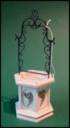 Brunnen mit Schmiedegitter